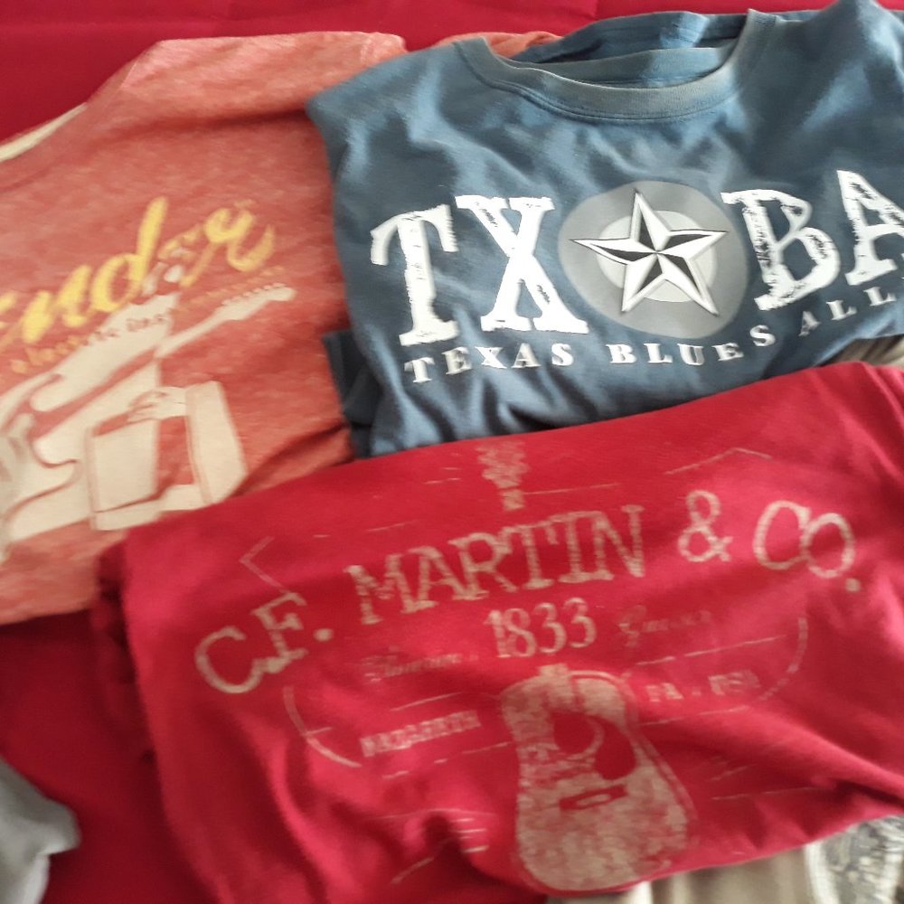 5 guitar/muscian themed size L t-shirts no rips,tears or stains